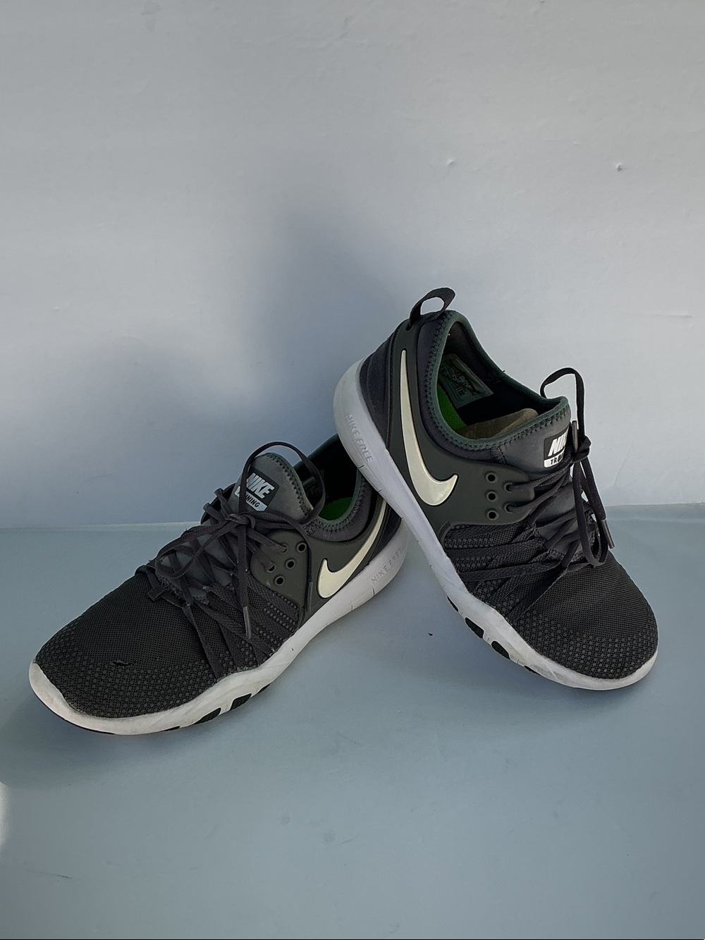 Nike Women's Black and White Sneakers with Green Inner Lining